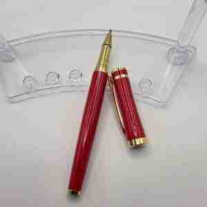 Close-up of Gold-Plated Clip on Red Executive Pen